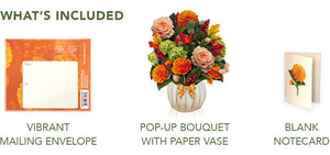 What's included photo showing mailing envelope, pop up bouquet, and blank notecard with a orange marigold.