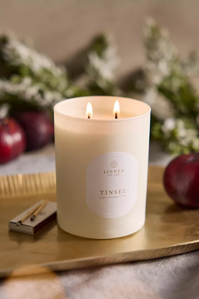 New limited edition holiday candle from Linnea called "Tinsel". Notes of ginger, champagne, and plum. 