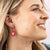 Red/pink beaded blossom petal drop earrings. Ink & Alloy. 