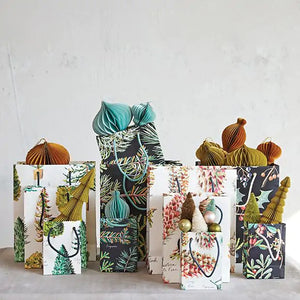 Evergreen botanical gift bags of various sizes with ornaments