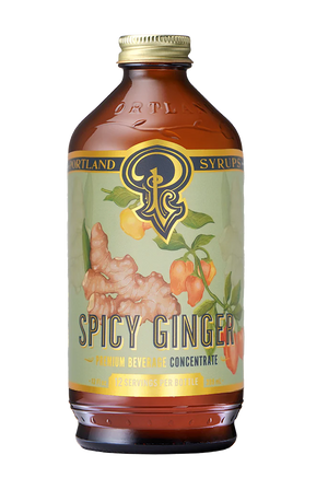 the spicy ginger syrup bottle with a green and gold label.