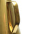 Handle detail of Stainless steel oil or vinegar cruet in gold finish. Kitchen decor. 