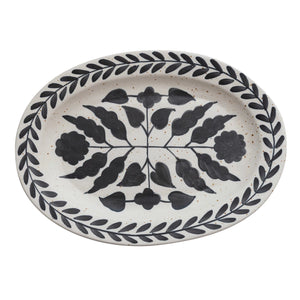 Oval stoneware hand painted black and white floral platter. 