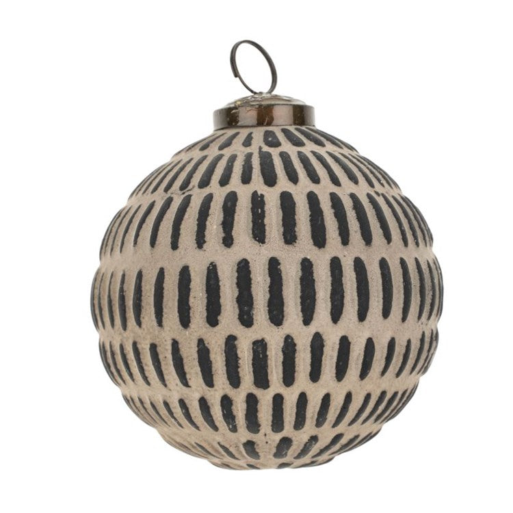 Black and white patinaed ball ornament in dot pattern