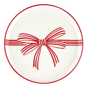 Holiday ceramic appetizer plate with red bow graphic. 