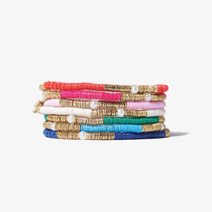 Collection of sequin stretch bracelets, pearl accents, various bright colors. Hand made in India.