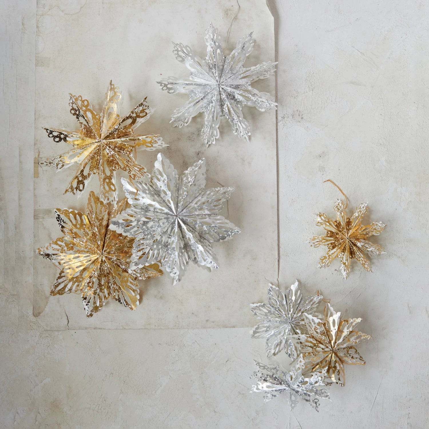 silver and gold shimmer paper snowflake ornaments