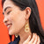 Brass interlinking circle dangle earrings. Ink & Alloy. 