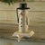 Painted cast iron snowman stocking hanger with black top hat and cigar.