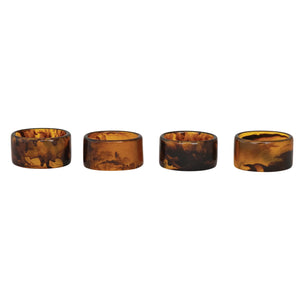 set of four tortoise shell resin napkin rings. 