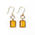 Two tone amber glass dangle earrings. Ink & Alloy.