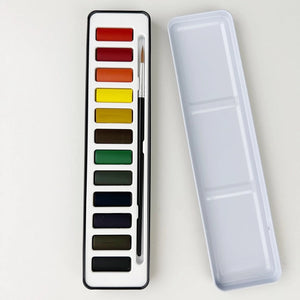 Watercolor pallet set in black tin holder, single paint brush included. Emily Lex studio. Holiday arts and crafts. 